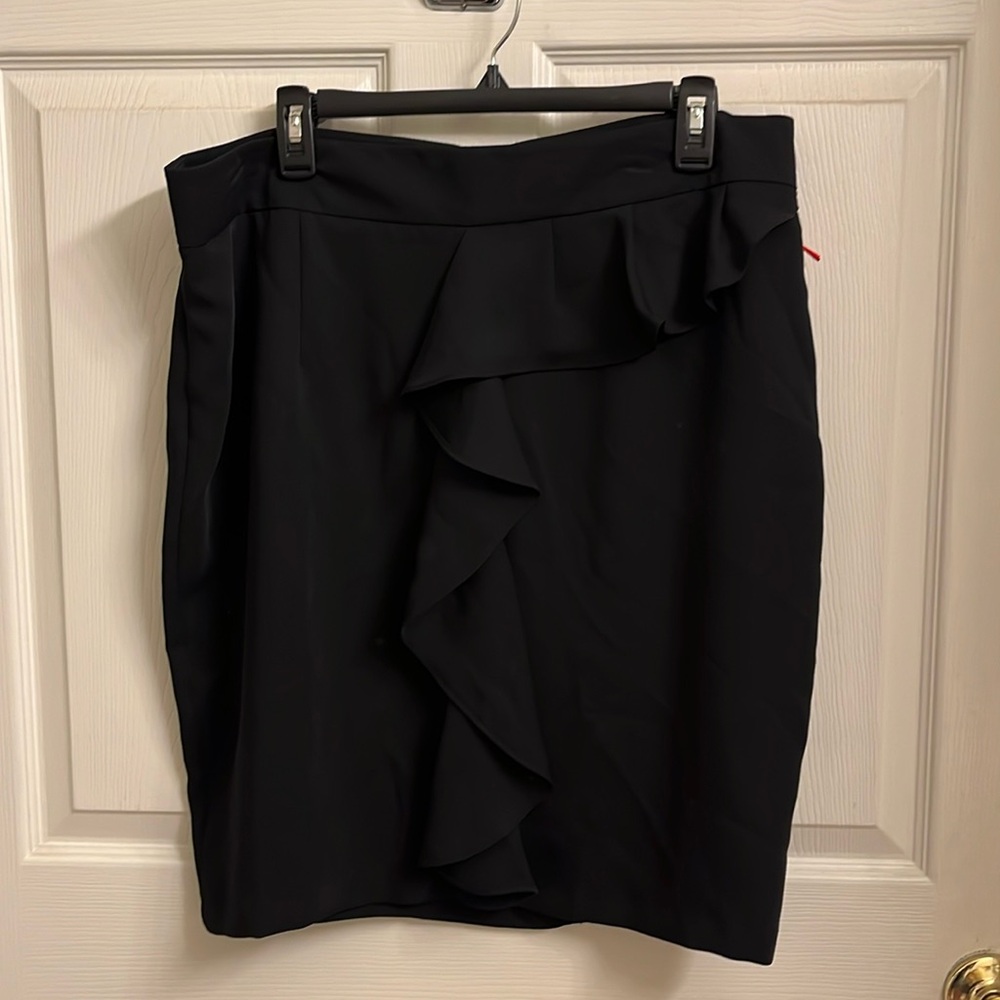 Elle black ruffled skirt. Size 16. New tags.